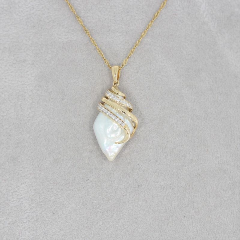 Wert 590 € Brillant Muschelkern Anhänger in 585er 14 K Gelbgold - H554
