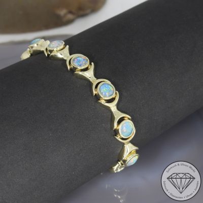 Wert 4900 € Opal Armband in 585er 14 K Gelbgold - 106703